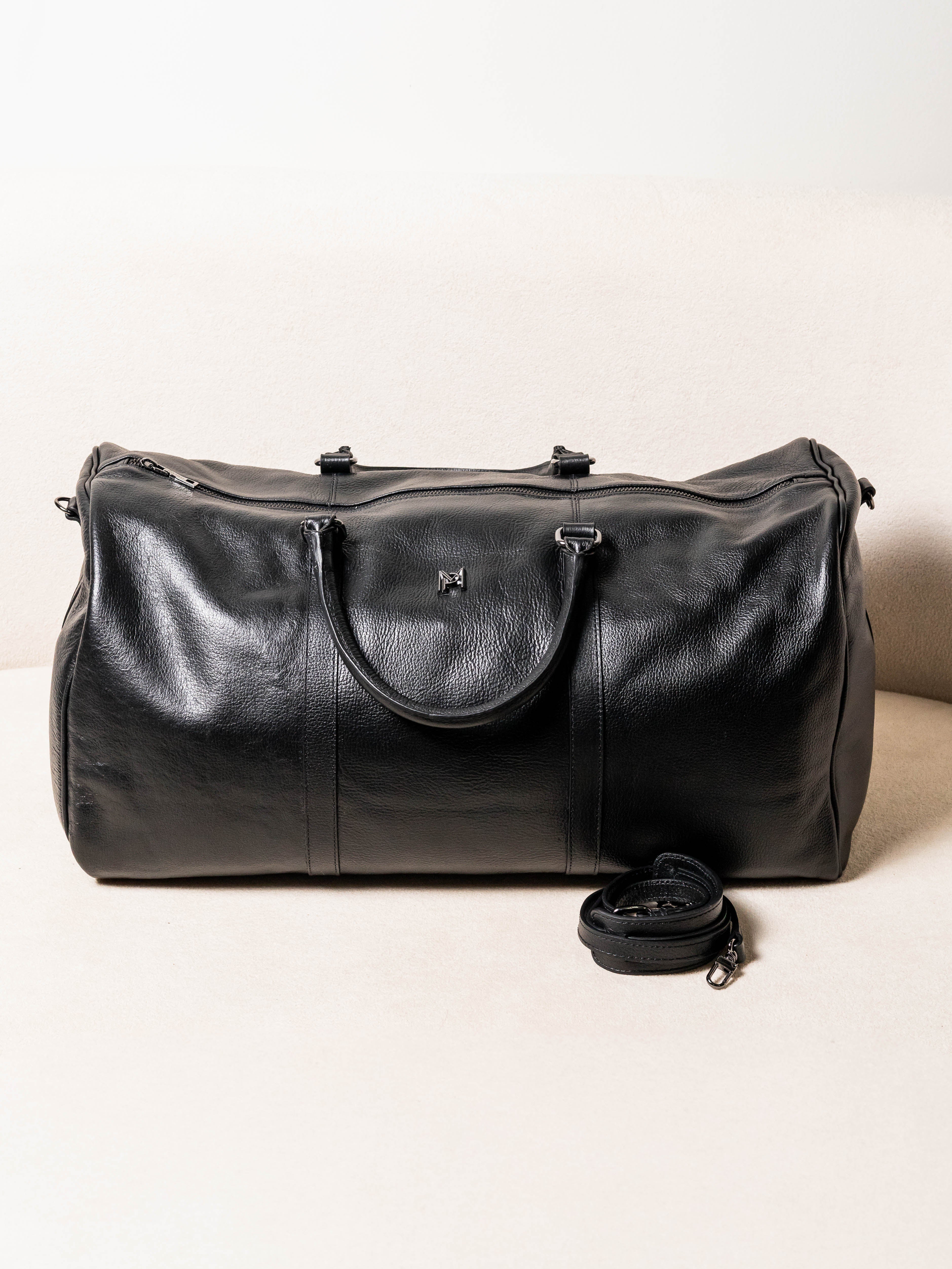 MALA TRAVEL DE MÃO DE COURO LEGÍTIMO PRETA