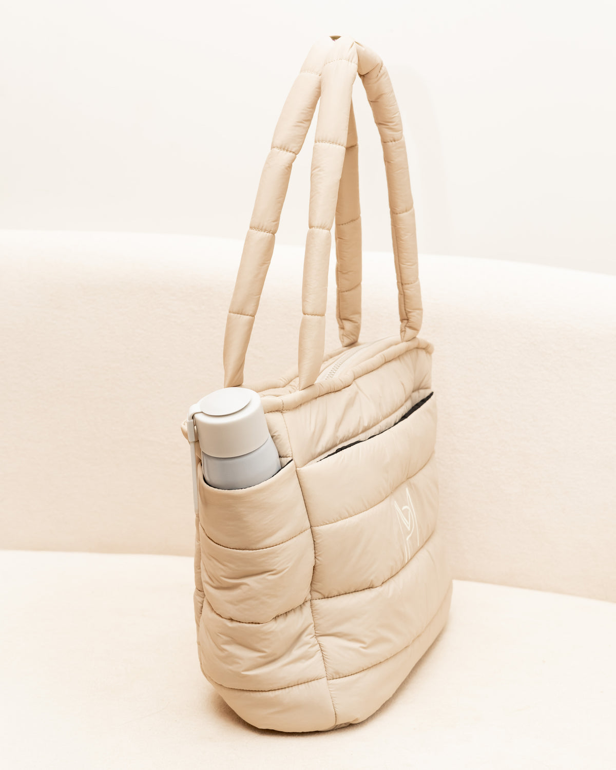 Bolsa Puffer Move de Nylon - Bege