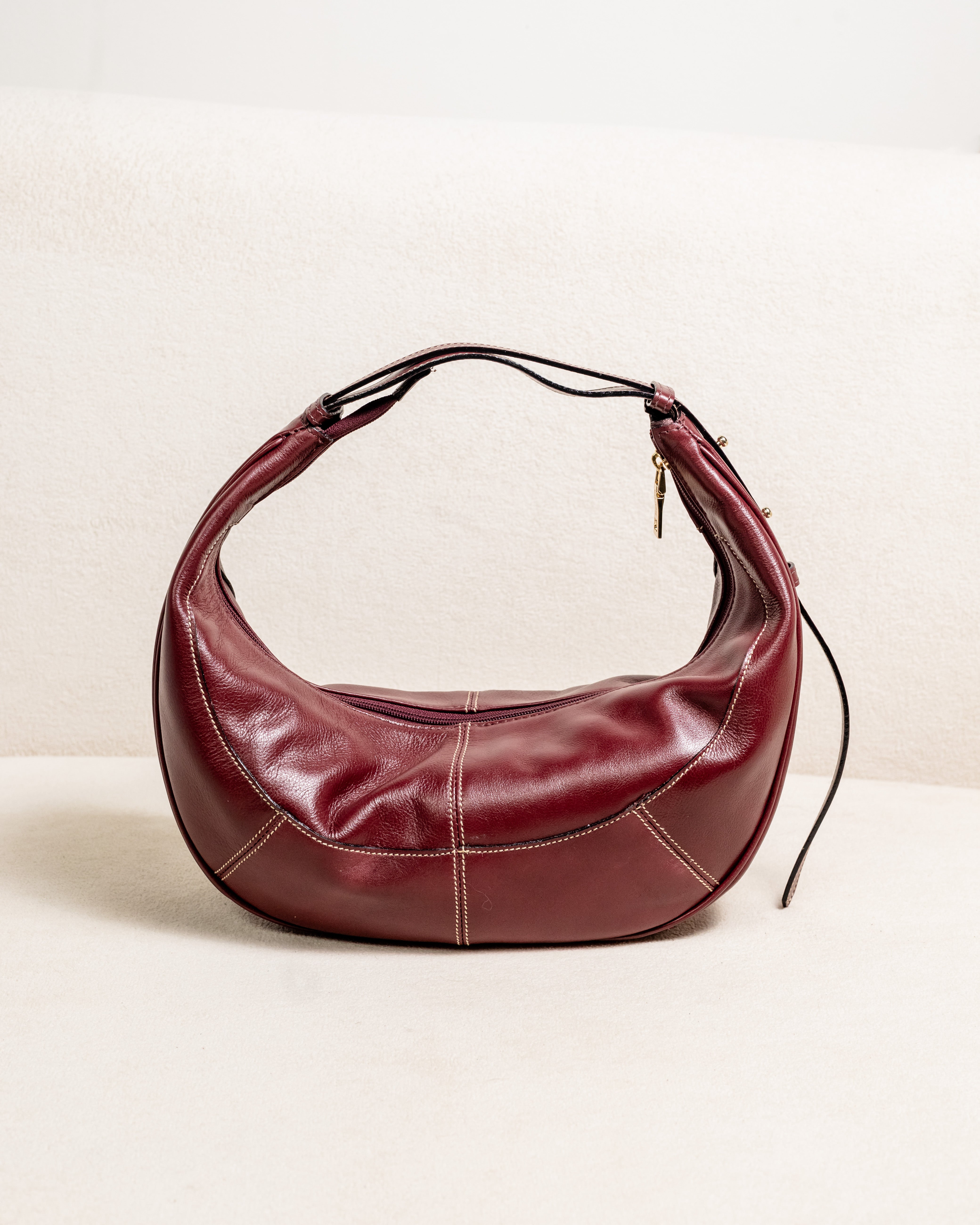 Bolsa couro legítimo meia lua Ayla - Marsala